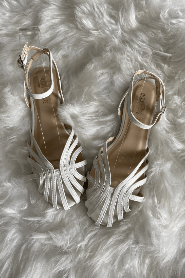 SOLE | Elegante platte gevlochten sandalen voor een verfijnde look